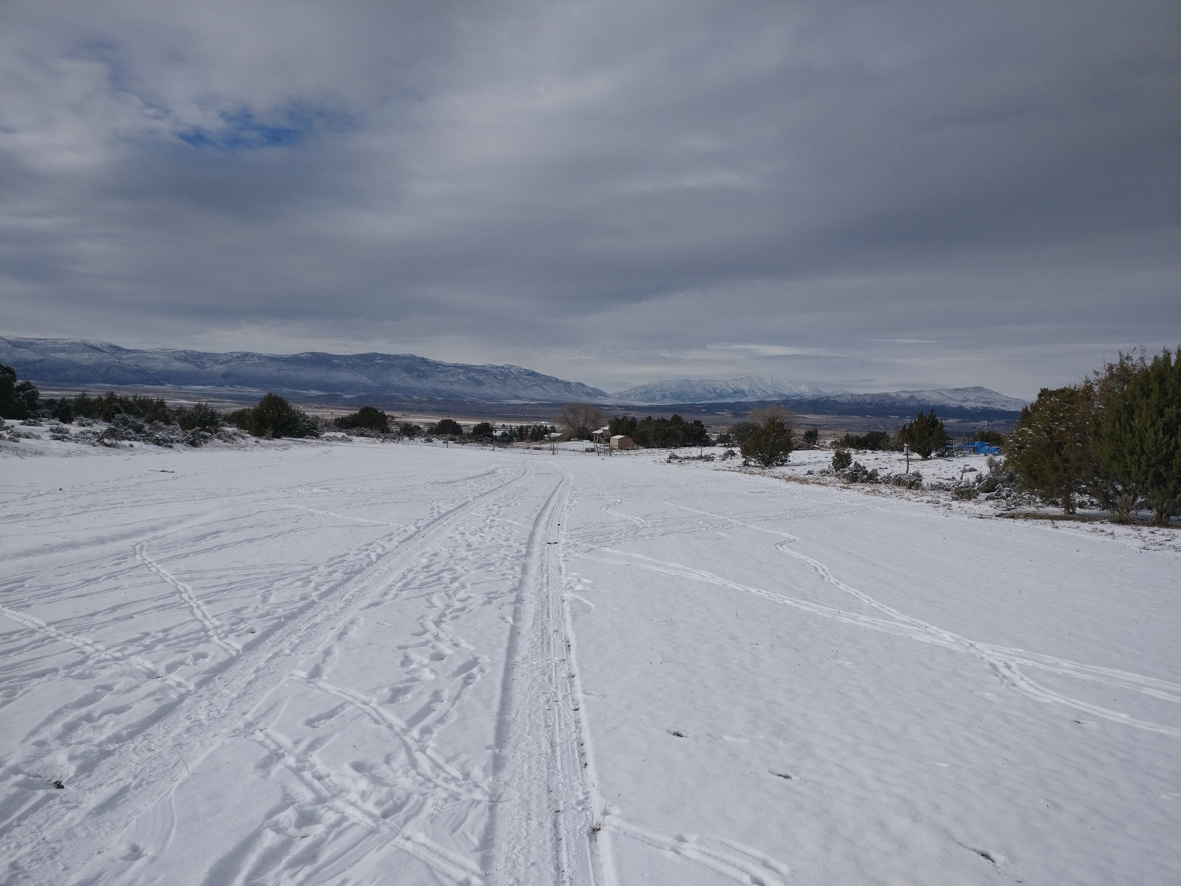 Valley view at sunset showing the Rencher's barn and chicken coop experiments